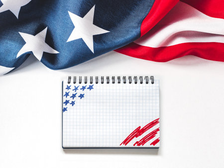 American Flag on white background and space for Your congratulatory inscription. Greeting card. Studio shot. Congratulations for family, loved ones, relatives, friends and colleaguesの写真素材