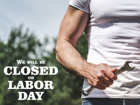 Signboard with the inscription We will be closed on Labor Day. Congratulations for family, loved ones, friends and colleagues. Holiday preparation conceptの写真素材