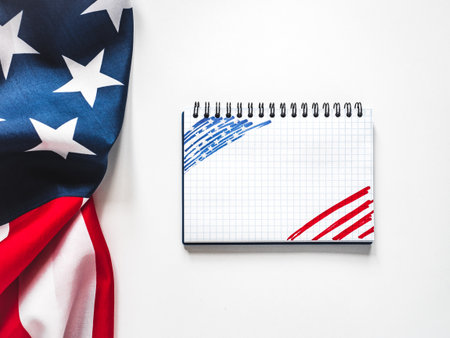 American Flag on white background and space for Your congratulatory inscription. Greeting card. Studio shot. Congratulations for family, loved ones, relatives, friends and colleaguesの写真素材