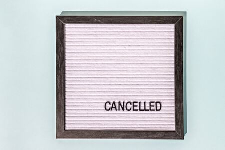 A message Board with the words canceled on a blue background. Concept pandemic coronavirus and the global crisis.の写真素材
