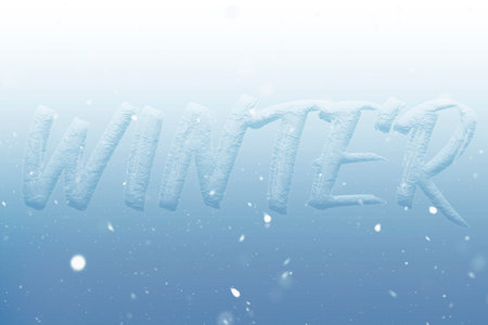 On a blue background with a texture of snow, the text in English Winter. Illustrationの写真素材