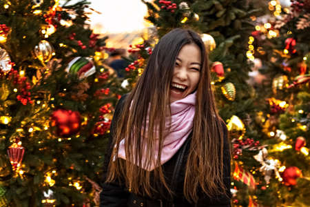 Bottles of VOGUE champagne, tangerine and Christmas tree branches. Preparation for the holidayのeditorial素材