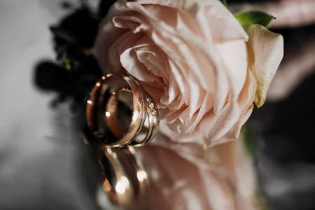Wedding rings with a bouquet of flowers. Marriage proposal. Wedding.の写真素材