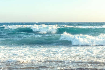 The coast of the Mediterranean Sea. The waves. The horizon. Sky and sea in summer.の写真素材