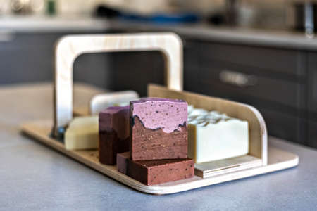 Layout and packaging of fresh prepared handmade soap and cosmetics for body skin care. Home spa. Small business.の写真素材
