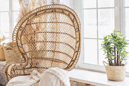 Wicker chair in the room.Boho style interior.の写真素材