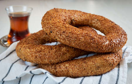 Simit / sesame seed bagel, Turkish tea and striped towel