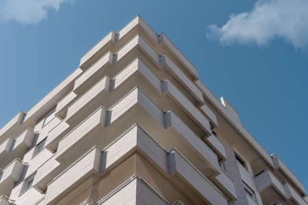 Corner of a modern European residential building. Abstract architecture, fragment of modern urban...