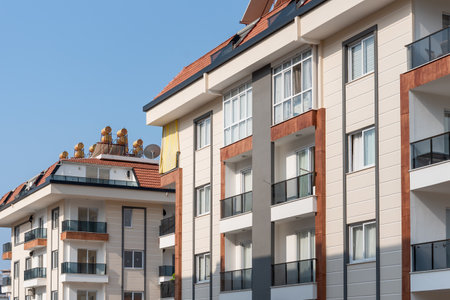 Row of modern residential apartment buildings on a sunny day. copyspace.