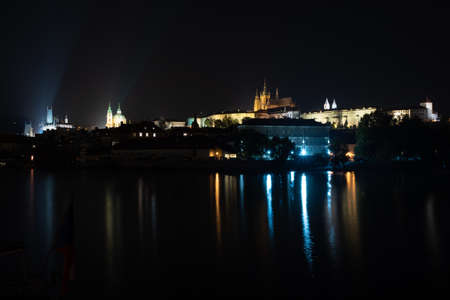 street lights and light from him on the Charles Bridge from the 14th century on the Vltava river and...