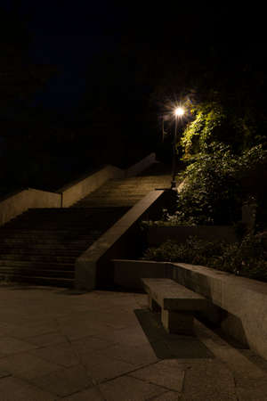 street lights in the center of prague at night and stairs in the old townの写真素材