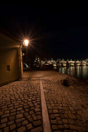 old opera in prague from the 19th century and light from street lighting in the czech republicの写真素材