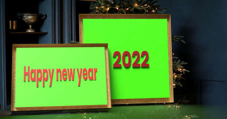 3D illustration of a wooden picture frame with green paper and the inscription happy new year 2022の写真素材