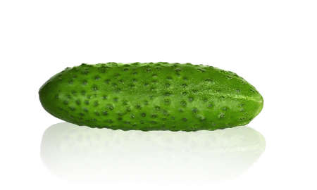 Isolated on a white background, a green fresh cucumber. Diet, proper nutrition.の写真素材