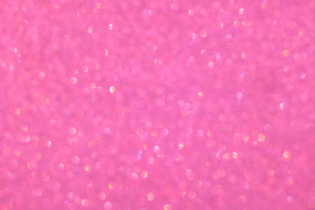 defocus pink background with bokeh for holidays, parties, postcardsの写真素材