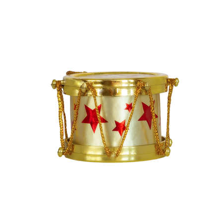 Christmas toy drum isolated on a white background. Merry Christmas and Happy New Year.の写真素材
