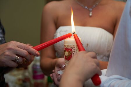Parents pass on their newlywed home through sparkの写真素材