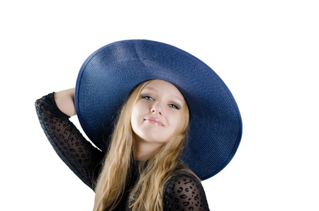 Beautiful girl in a blue hatの写真素材