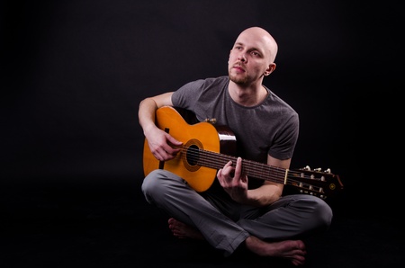 Nice bald guy with a guitarの写真素材