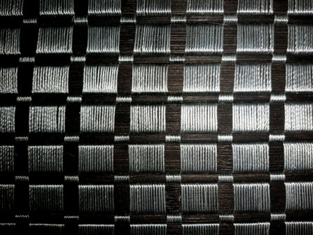 abstract background and texture of black carbon fiber, industrial background.の写真素材
