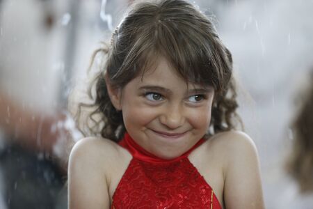 Belarus, Gomel, June 3, 2016 . Graduation in the kindergarten.The girl in the soap bubble.Be embarrassedのeditorial素材