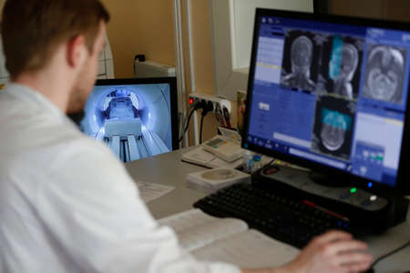 City of Gomel, Belarus 31 May 2017.Radiological medical center.Doctor observes magnetic resonance therapy.Medical examination of the bodyのeditorial素材