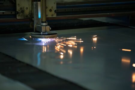 Plasma cutting of metal.Cutting of metal. Sparks fly from laser