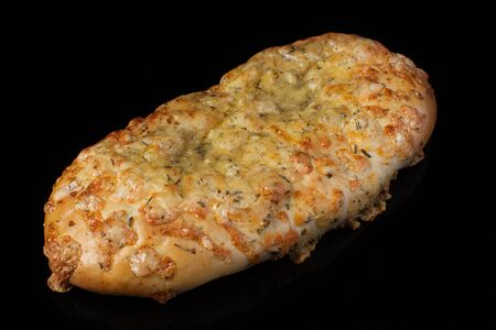 Bun with cheese and dill on a dark background.Georgian lavash with cheese