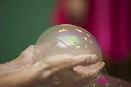 Soap bubble. Inflate the foam ball