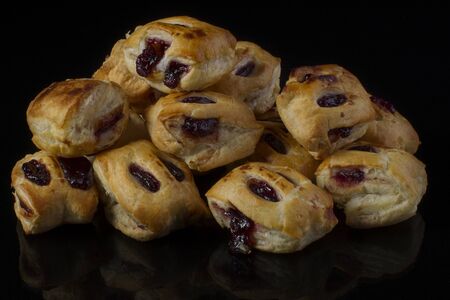 Puff pastry with jam closeup on a dark backgroundの写真素材