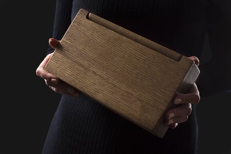 Wooden box in hand