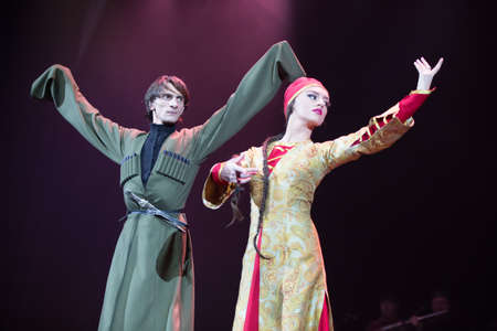 Belarus, Gomel, February 27, 2018. Concert hall. Speech of the national Georgian ballet Sukhishvili.Georgian male and female dancers perform national danceのeditorial素材