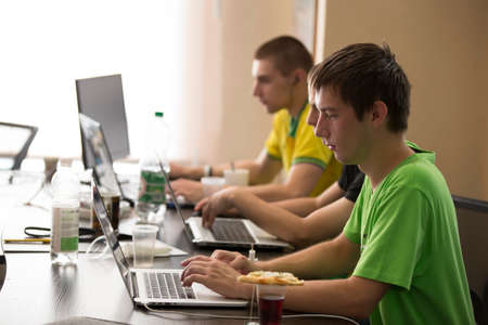 Belarus Minsk 06 August 2016 The Park of High Technologies. Competitions programmers.Programmers at work. Young guys work at computersのeditorial素材