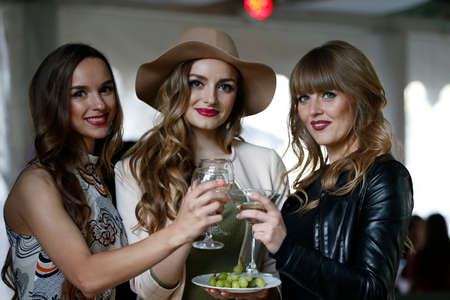 Belarus, Gomel, June 15, 2017.Restaurant Chabarok. Holiday of beauty and fashion, presentation of various cosmetics.Young models on the holiday celebrate a successful show.The problem of alcoholのeditorial素材