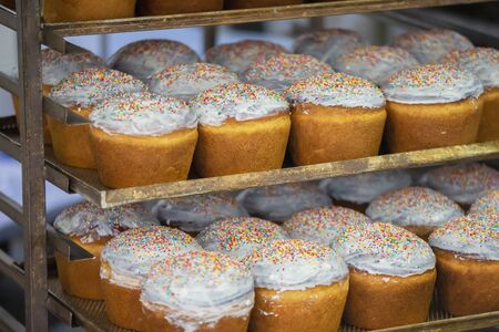 Pallets with baked Easter. Industrial production of Easter cakes. Bakery.の写真素材