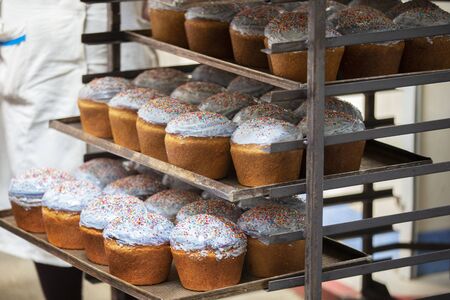 Pallets with baked Easter. Industrial production of Easter cakes. Bakery.