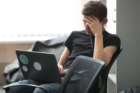 Belarus Minsk 06 August 2016 The Park of High Technologies. Competitions programmers.A young man is working at the computer.Work of the programmer.のeditorial素材