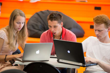 Belarus Minsk 06 August 2016 The Park of High Technologies. Competitions programmers.Students work at the computer. Tired studentsのeditorial素材