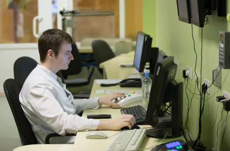 Belarus, Gomel, June 01, 2017, Central Hospital.The doctor works at the computerのeditorial素材
