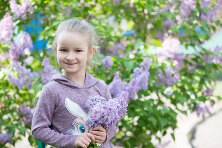 Belarus, the city of Gomel, May 11, 2019. Open day in kindergarten.A child in a lilac. Ordinary girl...