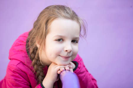 Belarus, the city of Gomil, April 25, 2019. Kindergarten city. Portrait of a beautiful little girl. The child is six years old.のeditorial素材