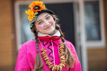 Belarus, the city of Gomel, March 09, 2019.Maslenitsa.Holiday seeing off winter.Russian girl at the holiday Maslenitsa.のeditorial素材