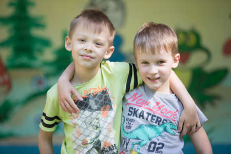 Belarus, the city of Gomil, April 26, 2019. Kindergarten on the street.Portrait of little friends. Boys from kindergarten in the playground.のeditorial素材