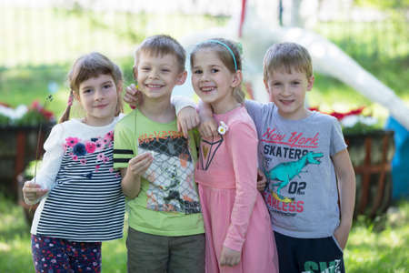 Belarus, the city of Gomil, April 26, 2019. Kindergarten on the street.Cheerful children from kindergarten on a summer walk.のeditorial素材