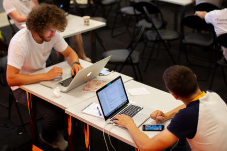 Belarus, the city of Minsk. Programmers Office. Programmers at the workplace. IT specialists.のeditorial素材