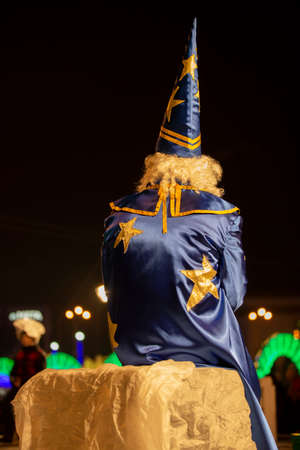 Belarus, the city of Gomil, December 10, 2019. The holiday of lighting the Christmas tree.A man in a wizard costume. Astrologer.のeditorial素材