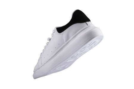 Sport shoes. White sneaker with black accents on a white background.の写真素材