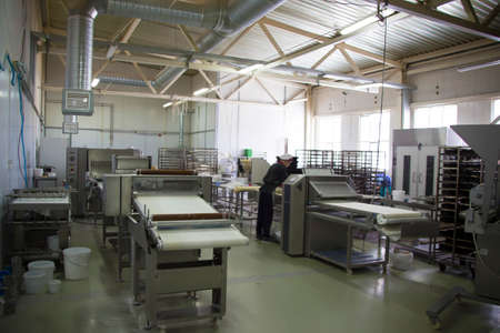 Factory for baking culinary products.Industrial baking line.Culinary production