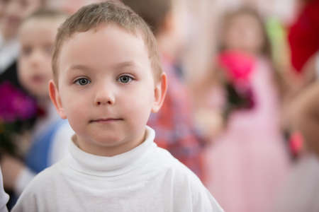 Belarus, Gomel, 6 March 2018. Kindergarten is the fifth. Children's holiday matinee.Portrait of a five-year-old funny boy with puffy cheeks and blue eyesのeditorial素材