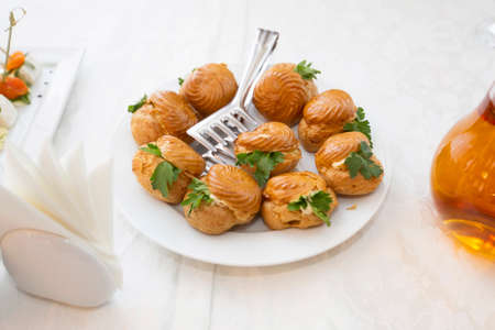 Buffet Dish. Choux pastry on the table
